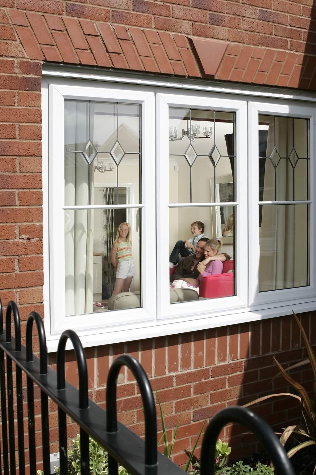 family-through-pvc-window